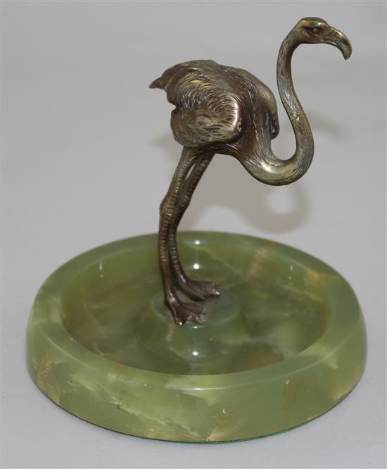 An early 20th century silvered bronze and green onyx ashtray, 6in.